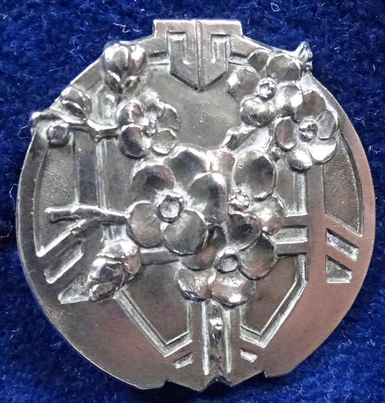 Silver button, Oriental style blossom and moon gate