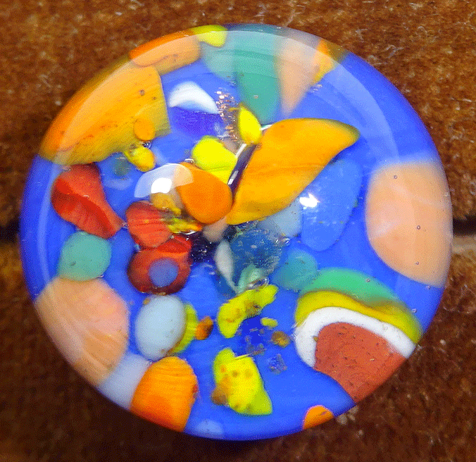 Vintage millefiori paperweight button, orange on blue