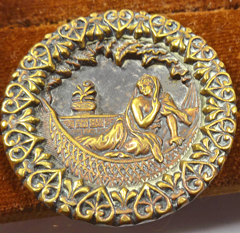 Female figure in hammock