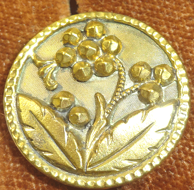 Gilt metal stylised flower