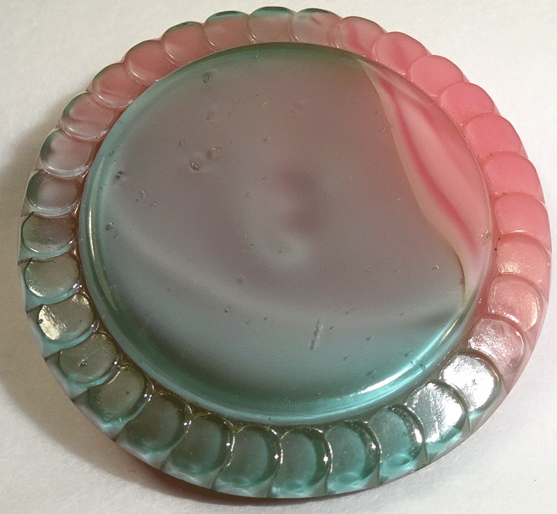 Mixed grey and pink glass button