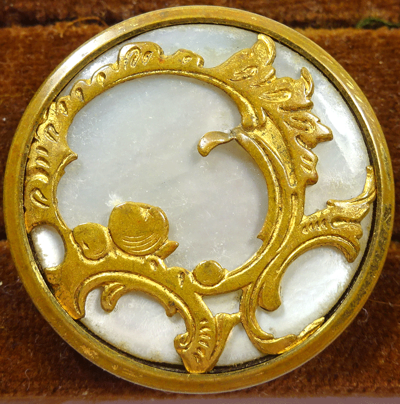 Pearl under gilt metal