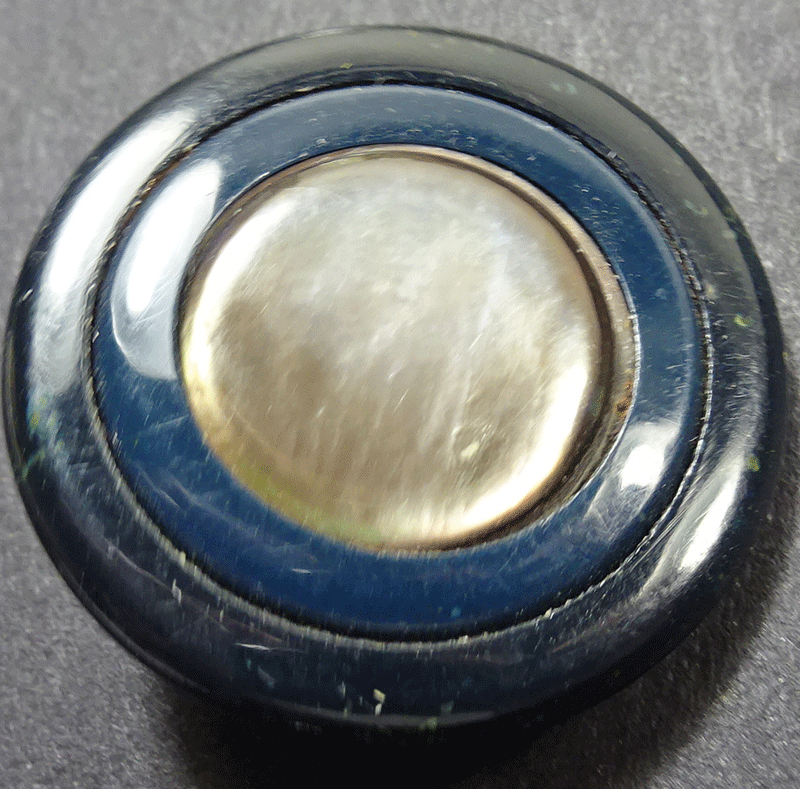 Mother of pearl in blue-black metal frame