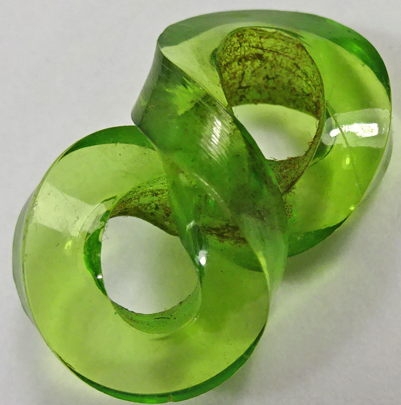 Translucent green buttons, figure of eight
