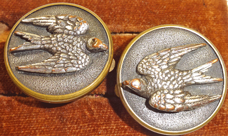 Pair of Wests Patent solitaire, with silvered bird