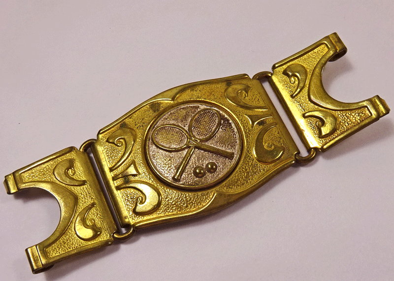Three piece belt buckle with tennis rackets