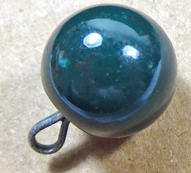 Dark green waistcoat ball buttons