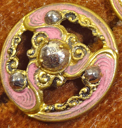 Small pierced and painted metal with cut steels
