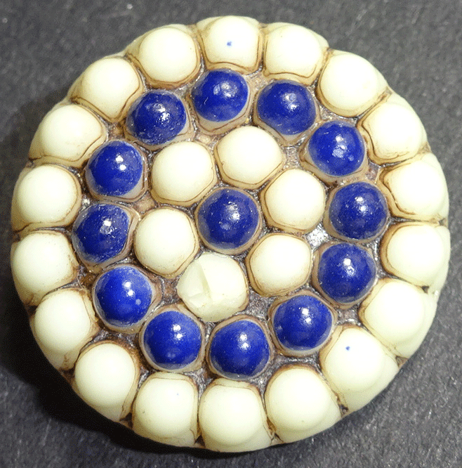 Cream and blue bobble glass