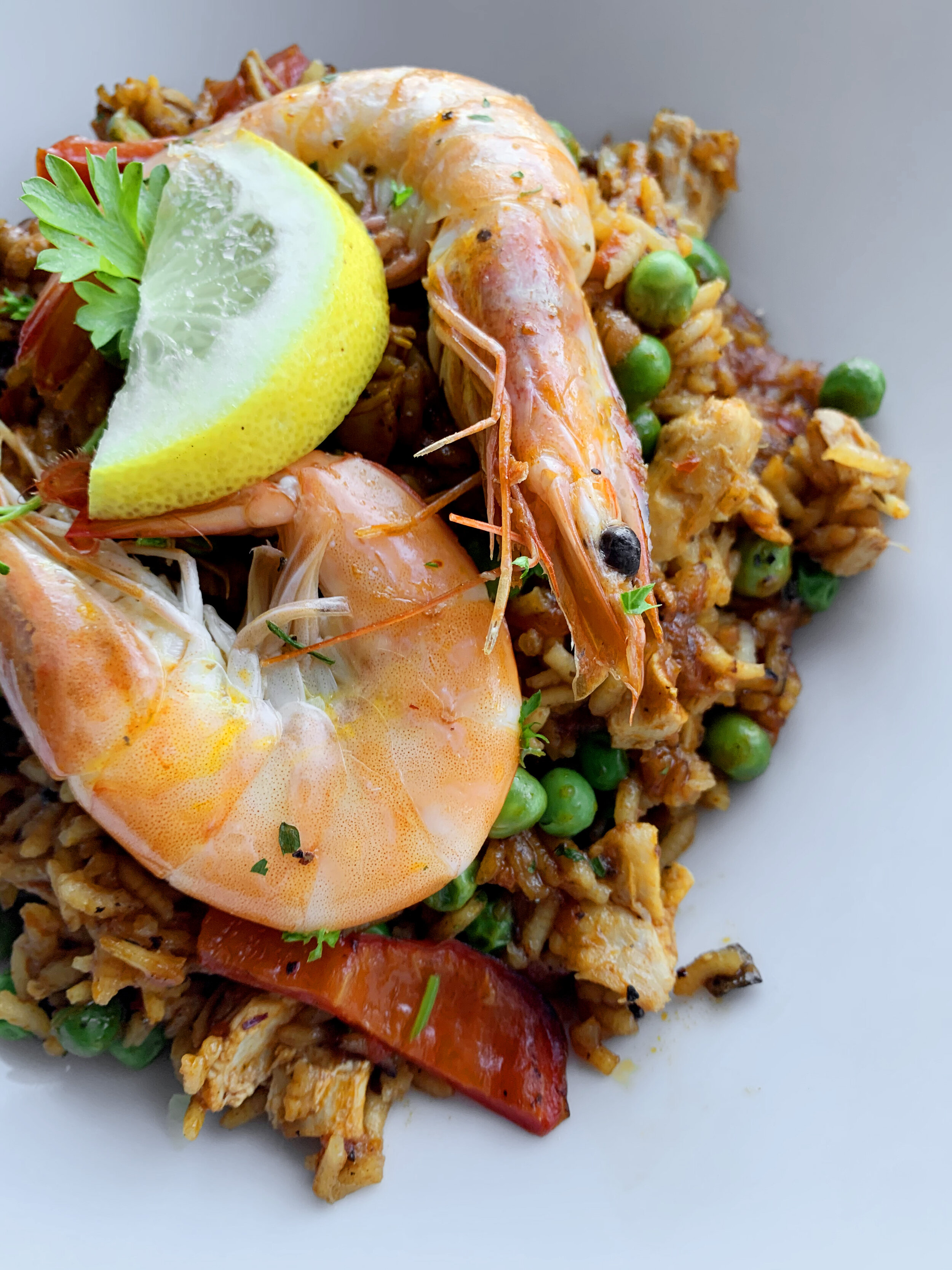 Pick any favorite shellfish, poultry, chorizo or veggie for your topping.