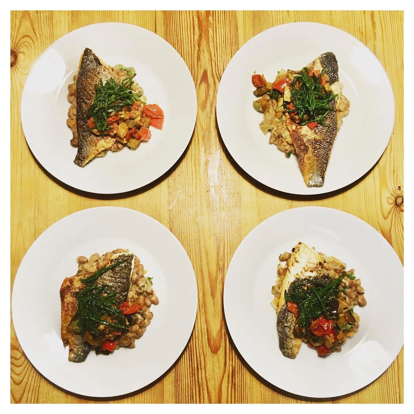 One of our most popular dishes: sea bream, with borlotti beans, vegetables Proven&ccedil;al, and samphire.