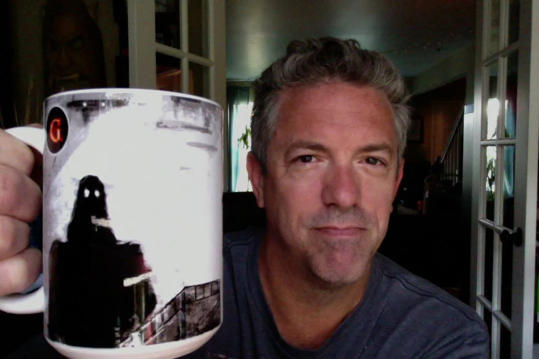 Toasting with a Gamut mug.