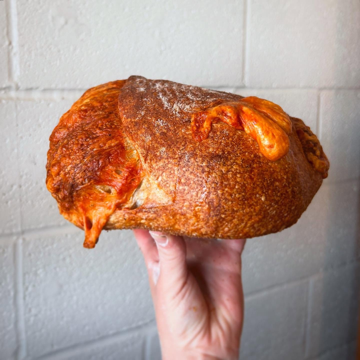 Nothing like a cute loaf of sourdough cheese waiting for you in the morning. Come get your bread, we are here till 2:00.