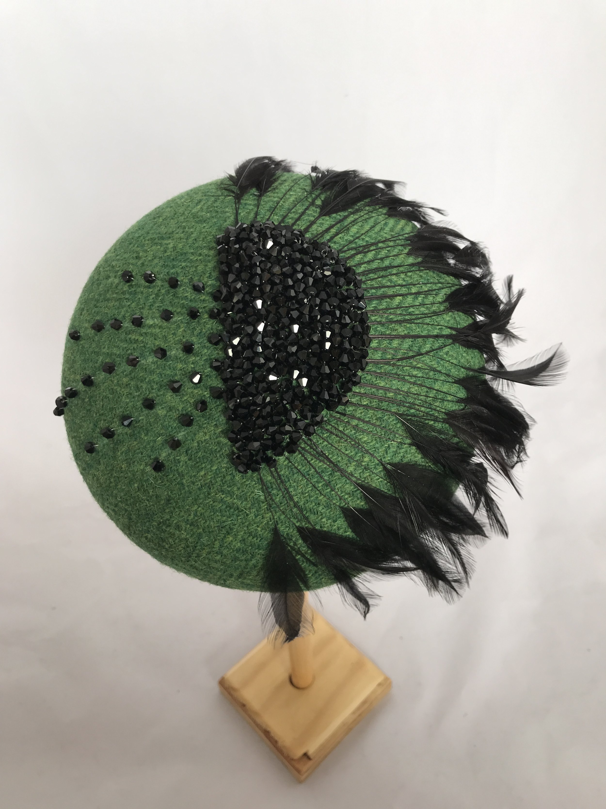 Agatha - green Harris Tweed with black crystals and feathers