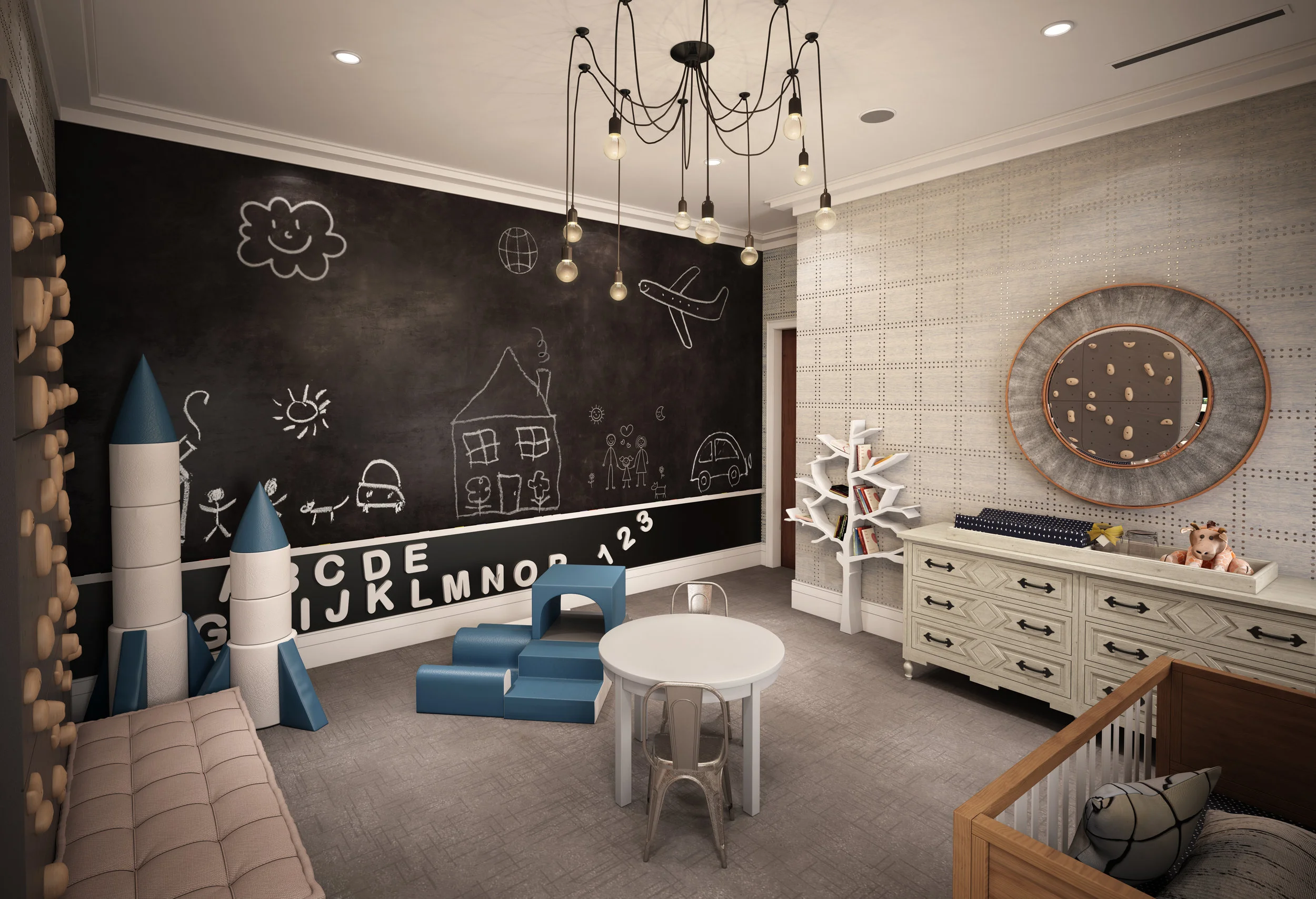 A magnetic chalk wall in a boys nursery designed by Rockabye Mommy