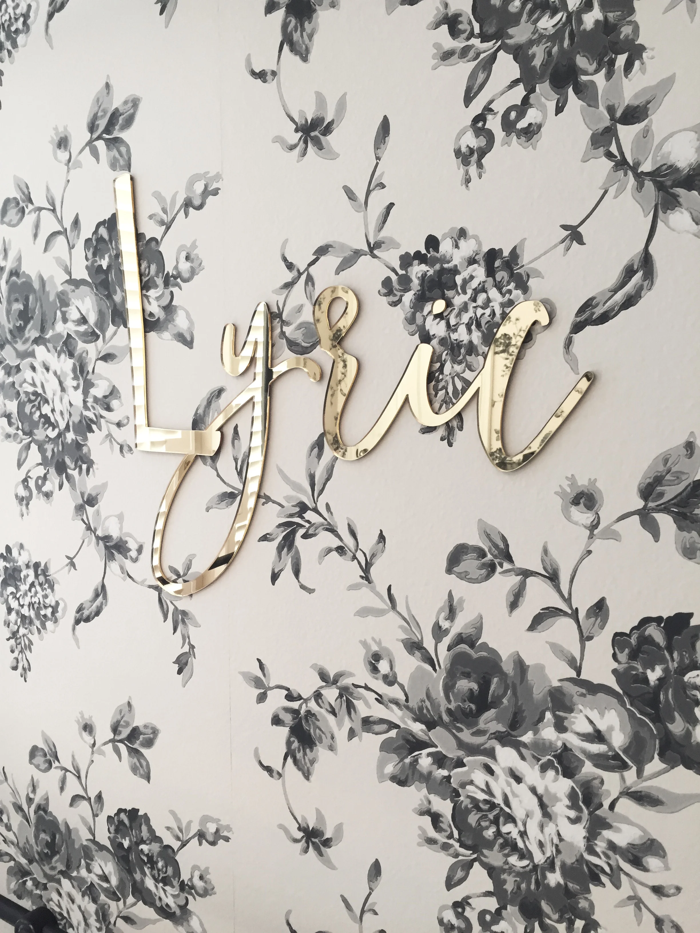 Mirrored name plate in Backstreet Girl's nursery designed by Rockabye Mommy