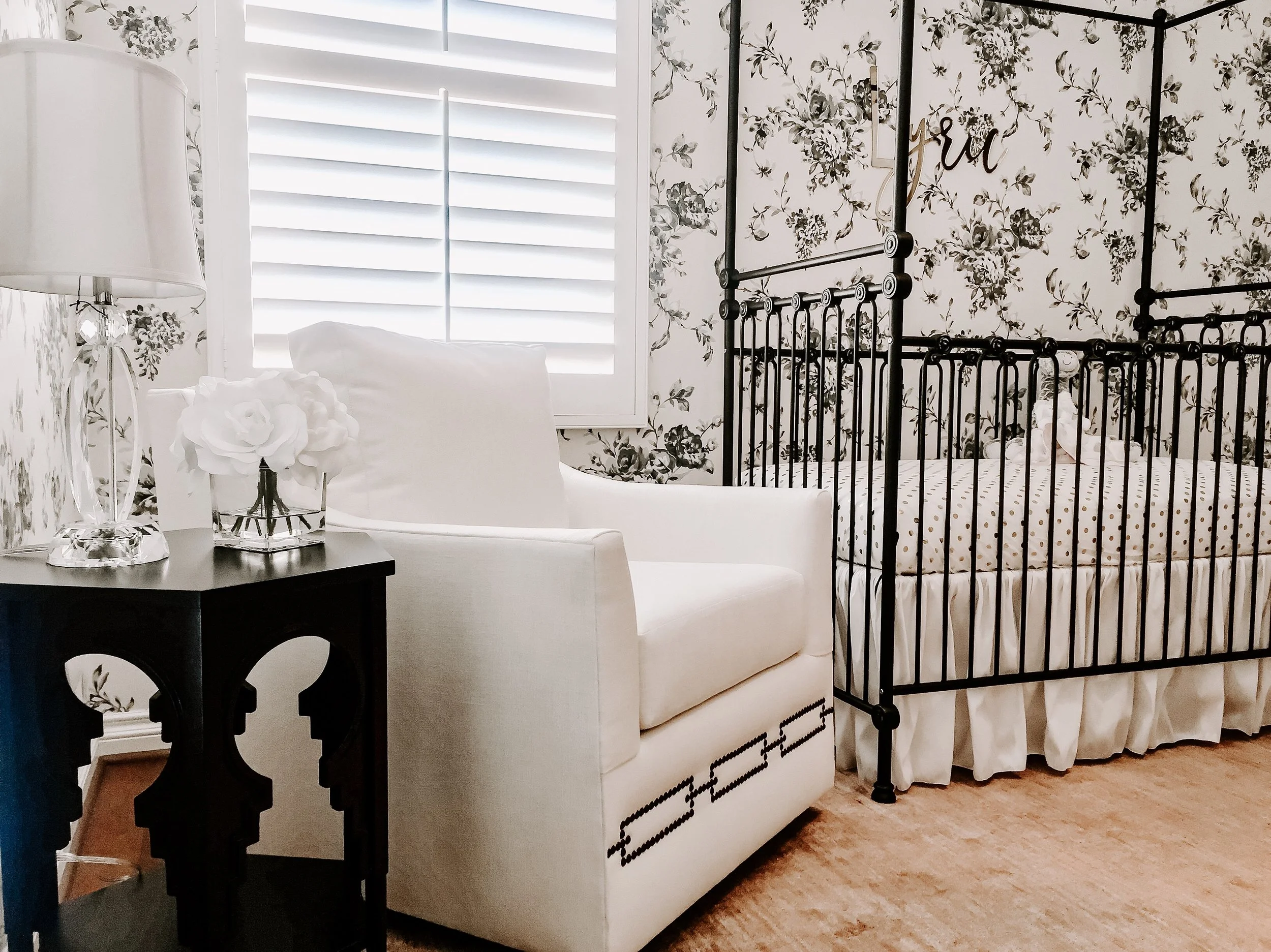 Four Poster Iron Crib from Bratt Decor in a Girls Nursery designed by Rockabye Mommy