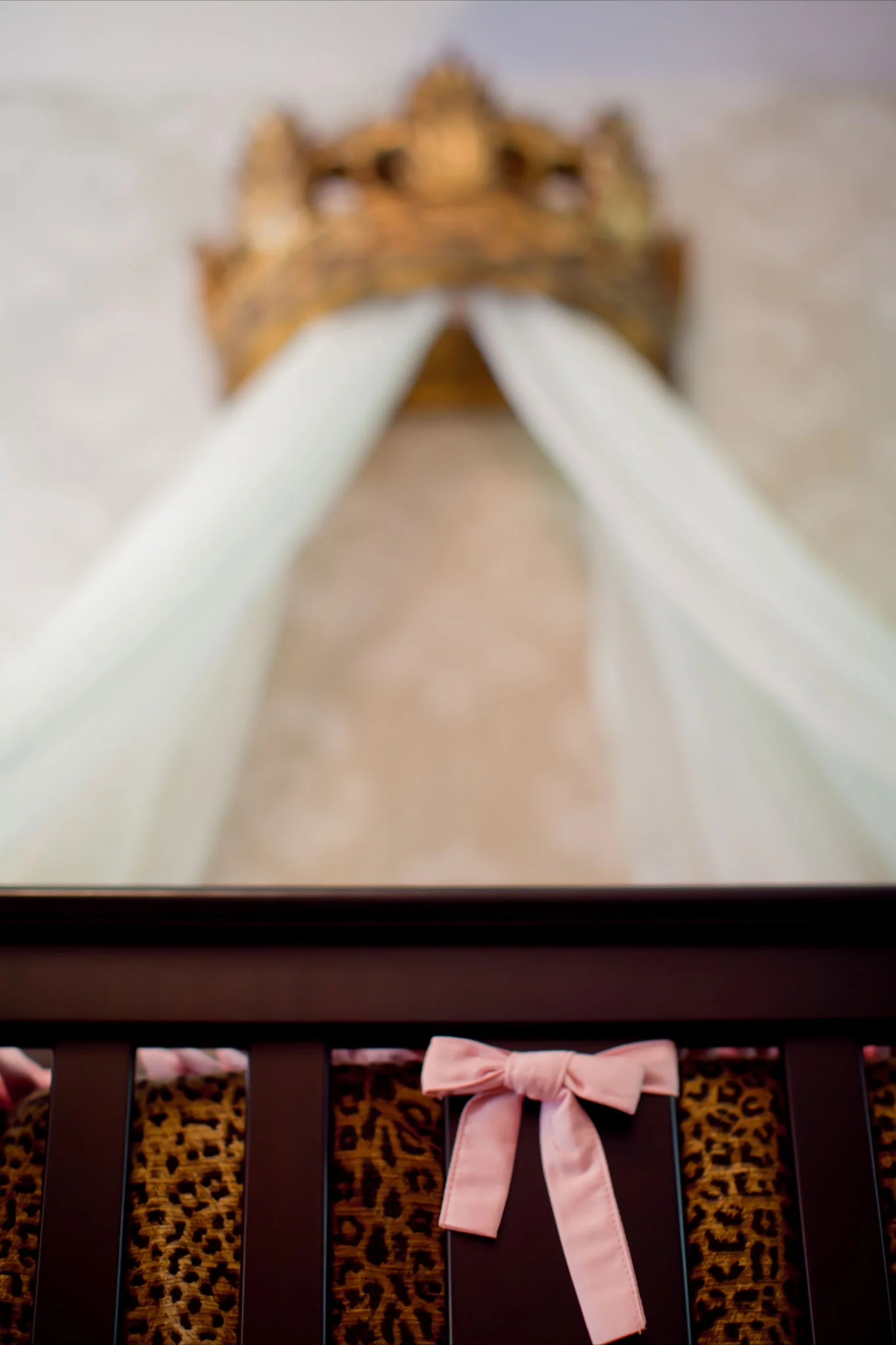 Gold Crown Canopy over Crib in a girls nursery designed by Rockabye Mommy