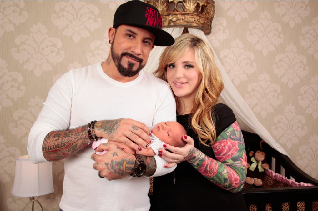 AJ & Rochelle McLean in their daughter's nursery designed by Rockabye Mommy