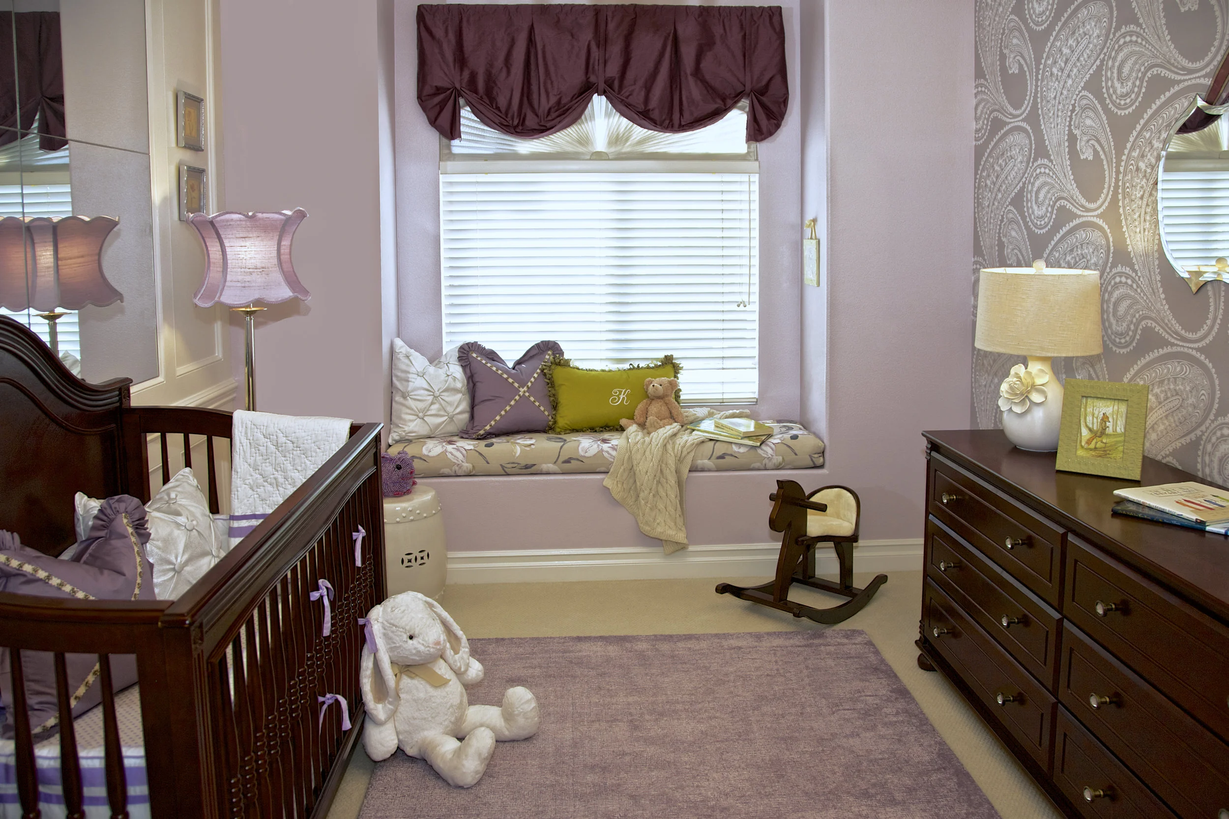 A built-in Window Seat Bench in Nursery Room designed by Rockabye Mommy