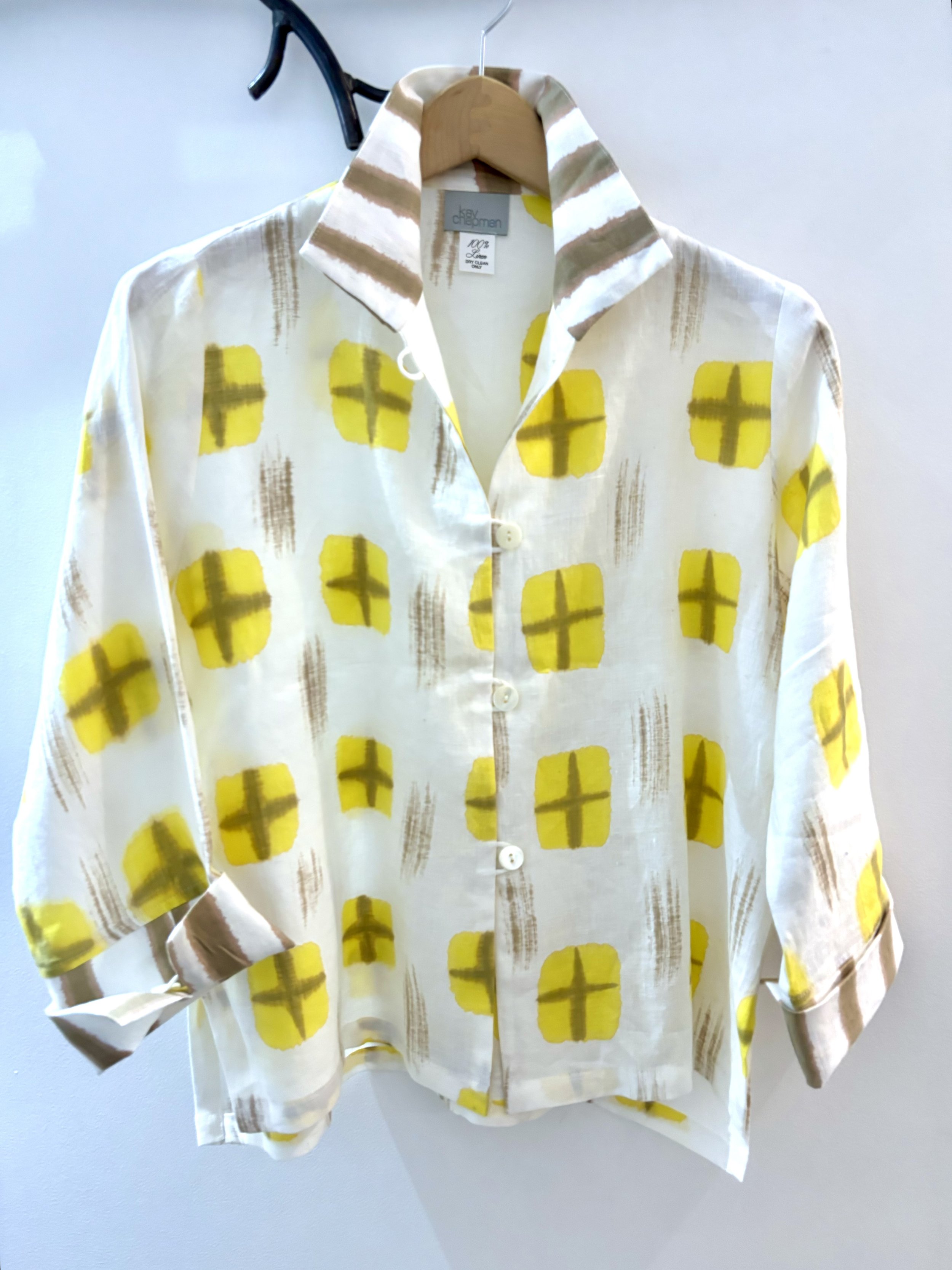 KAY CHAPMAN YELLOW CROSS SHIRT 2:24.jpg