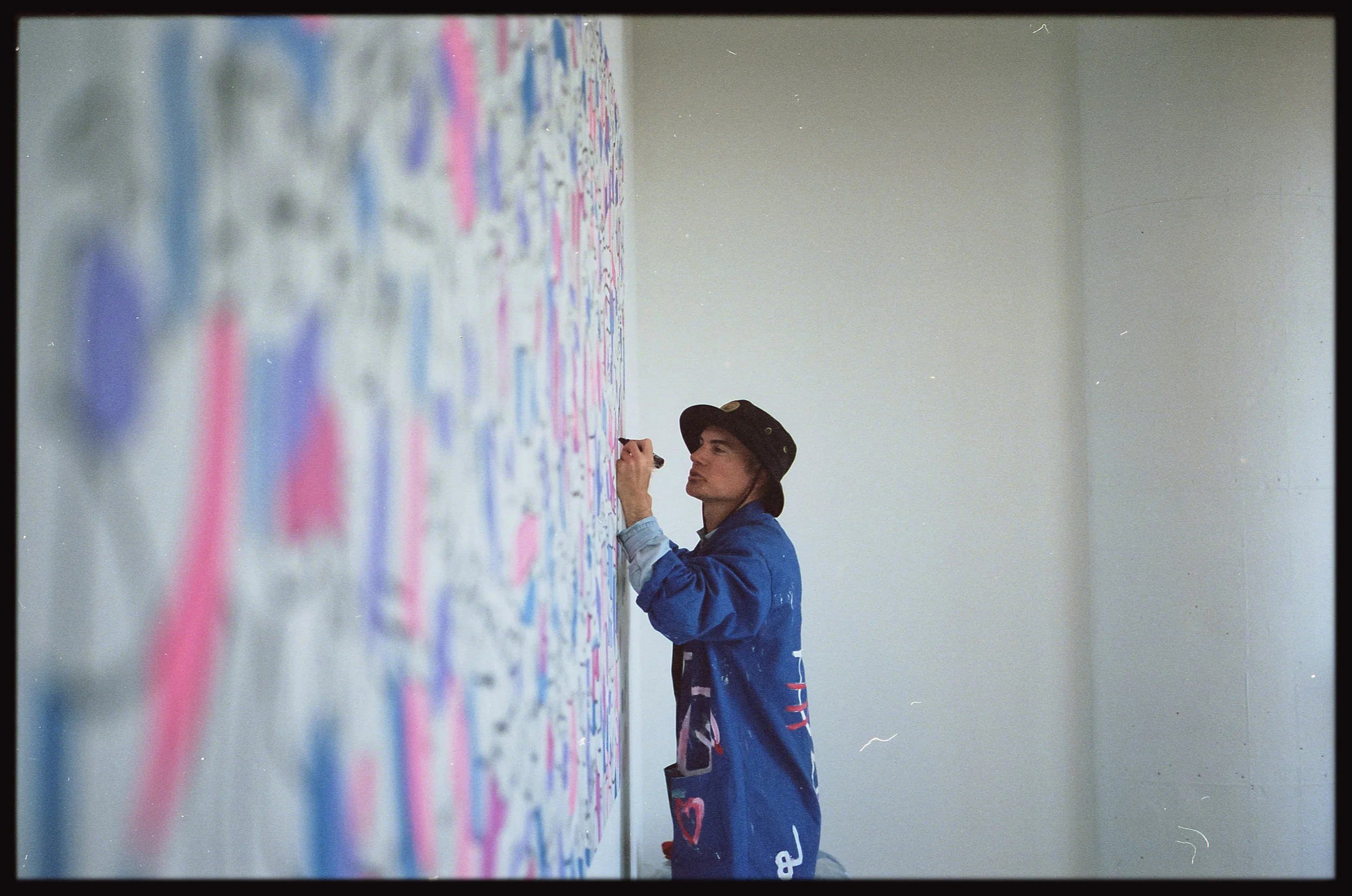 The mural shows the people of Emulate working together. Photo by Lian Leng