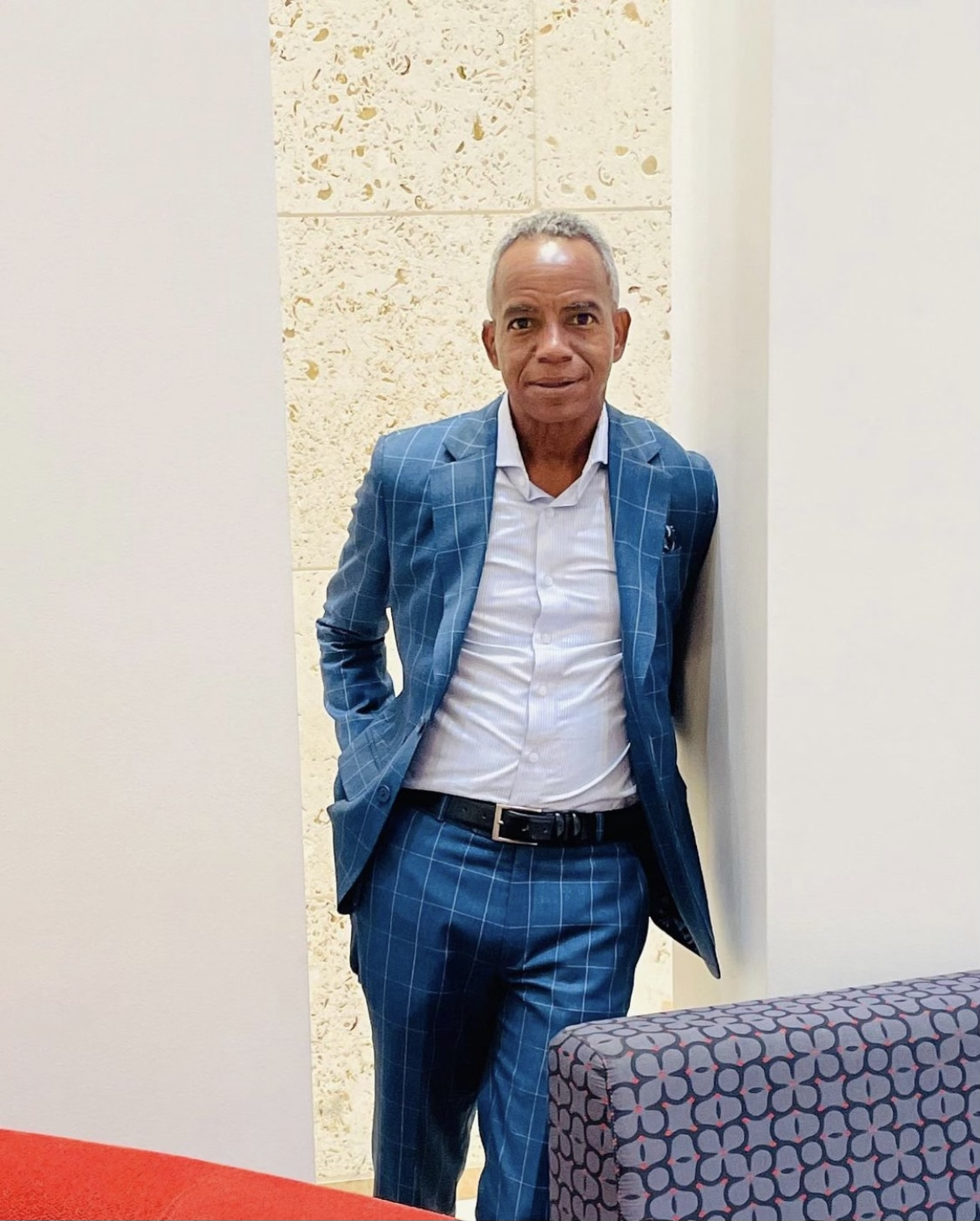 Rickie Leaning on Wall .png