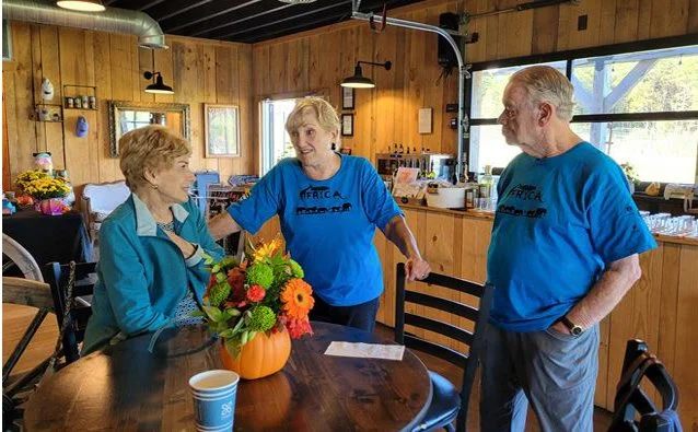 Bunny B, Barbara B and husband John catch up.