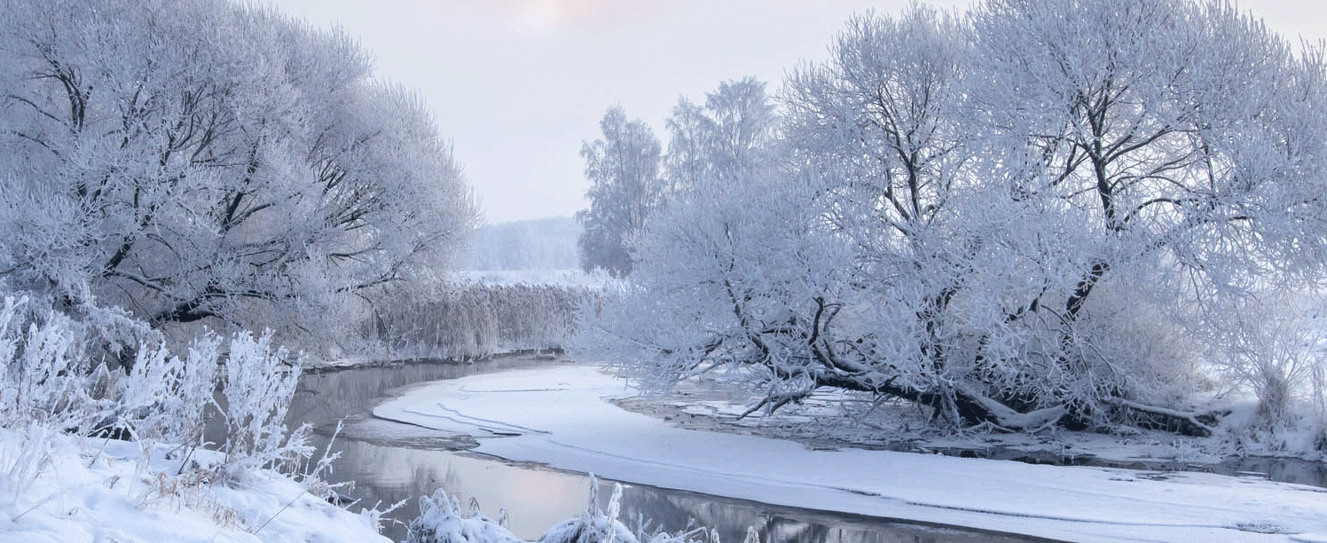 Snowy creek with a hidden sunset.