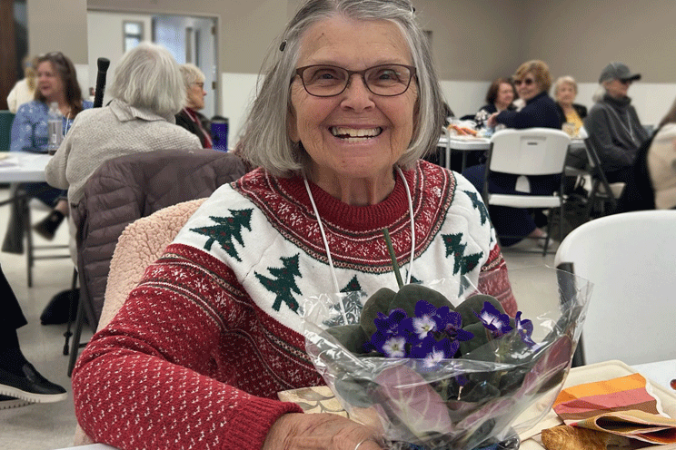 Kathy is all smiles over violets