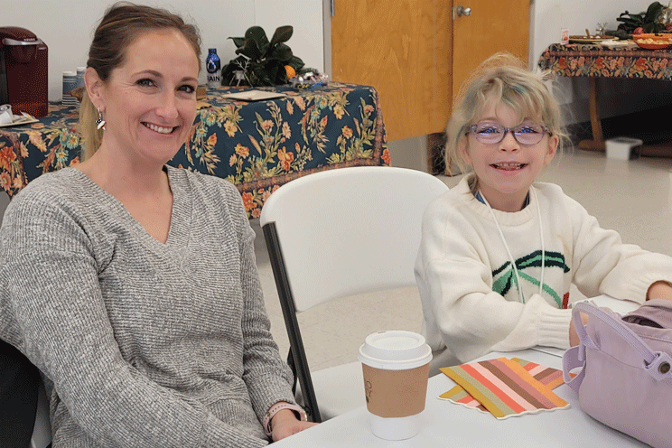 Rachel and daughter mug for the camera