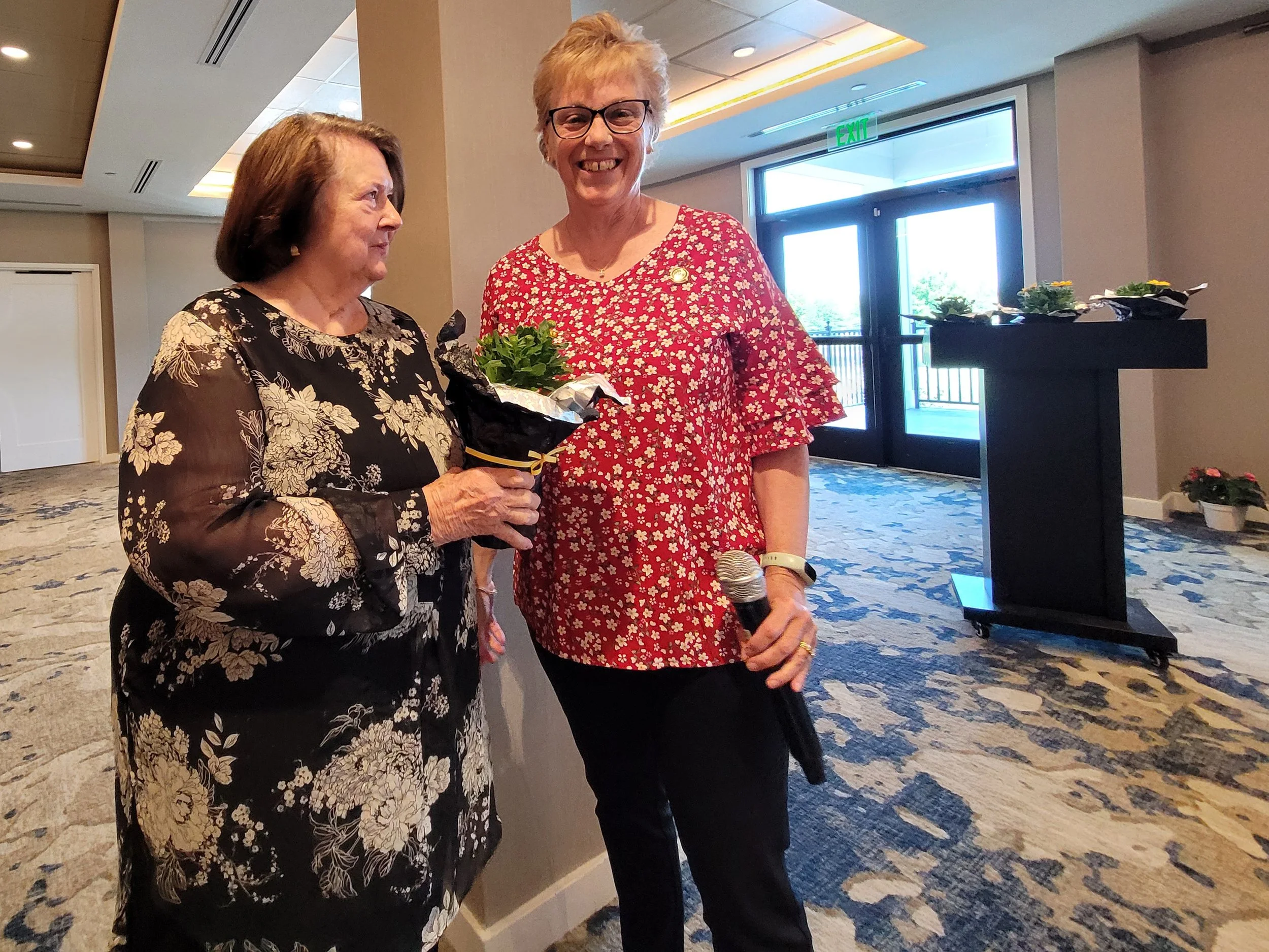 Bev is voted in as President...as Jane accepts her flowers.