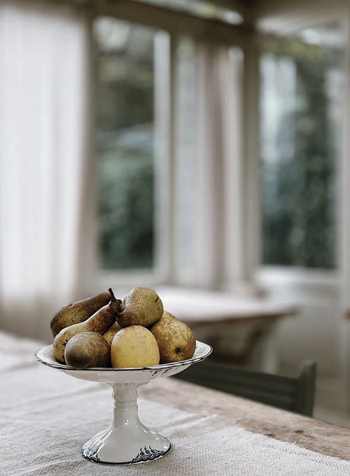 pears in pedestal bowl