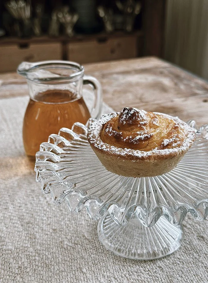 honey and pastry on table
