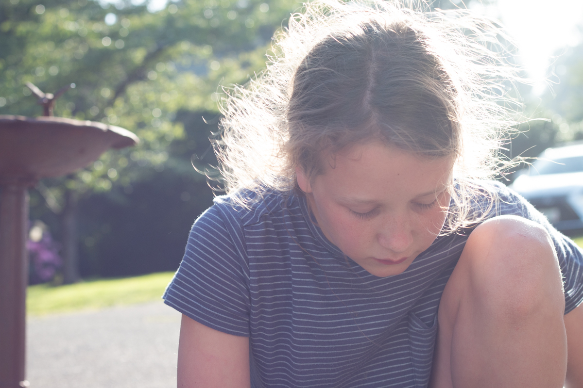 Girl playing outdoor in sunlight.jpg