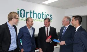 iOrthotics business owners showing off their new 3D printed orthotics to Trevor Evans, LNP candidate for Brisbane, Federal Treasurer Scott Morrison MP and State Opposition Leader Tim Nicholls MP.
