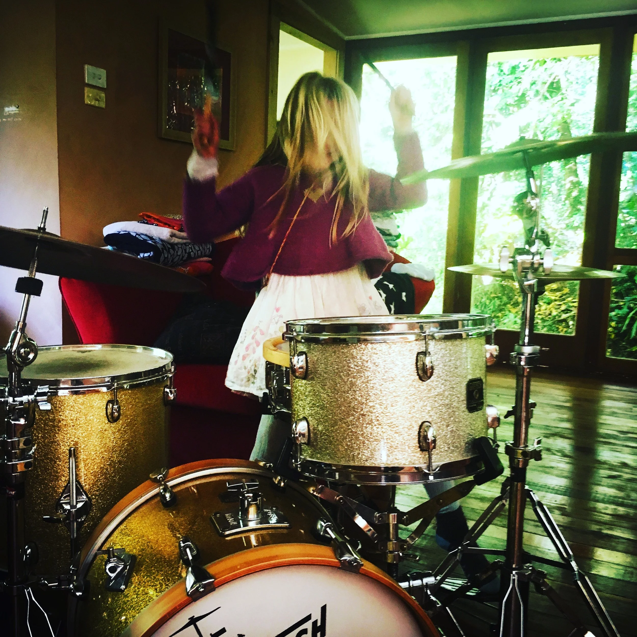 Little Storytellers children play music drumming.jpg
