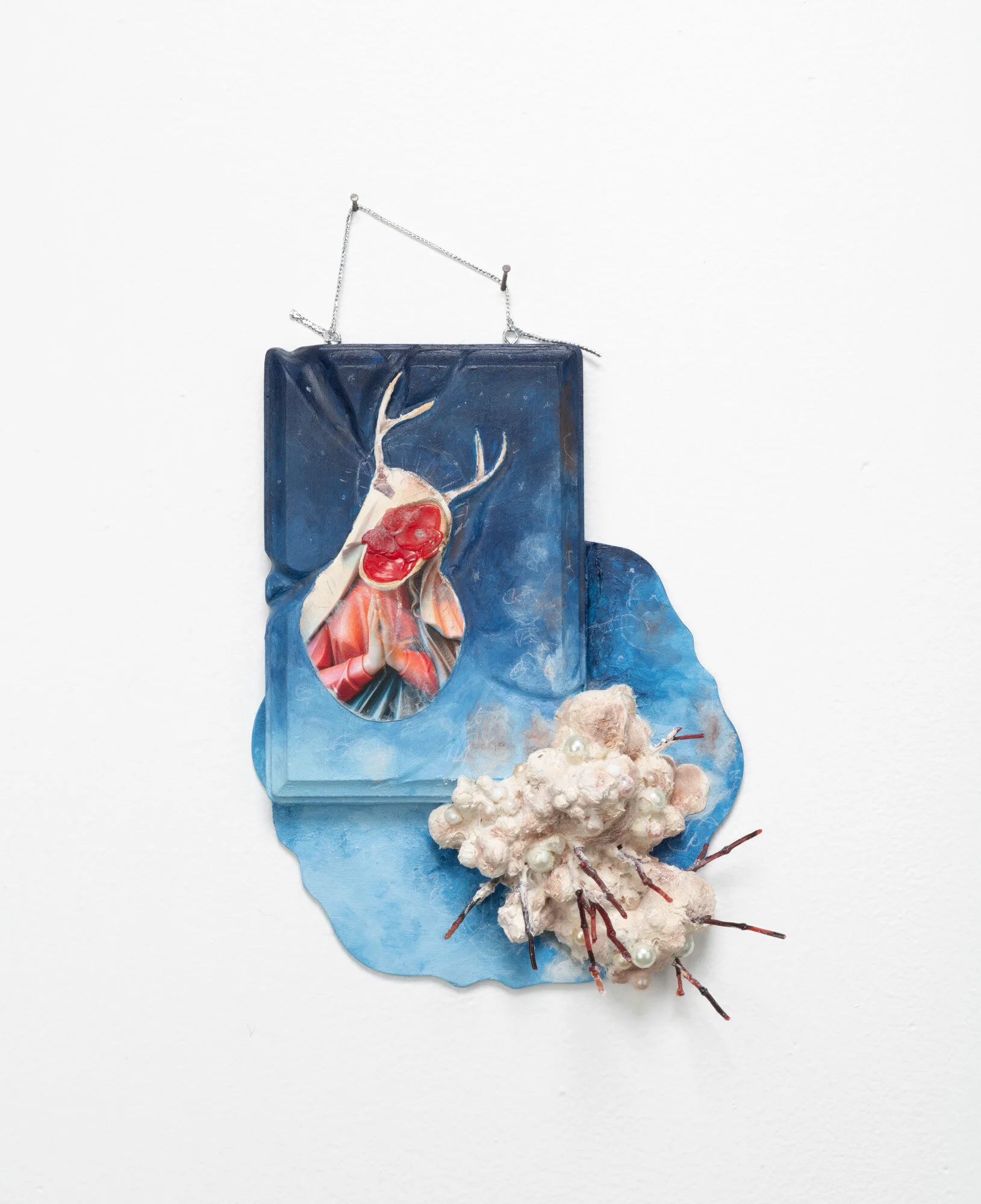  Found and altered objects (wood panels, tiddlywinks, styrofoam fruit, faux floral stems) collage, plaster, molding paste, acrylic paint, graphite, conte crayon, silver cord, hardware. 9” x 13” x 3”. 