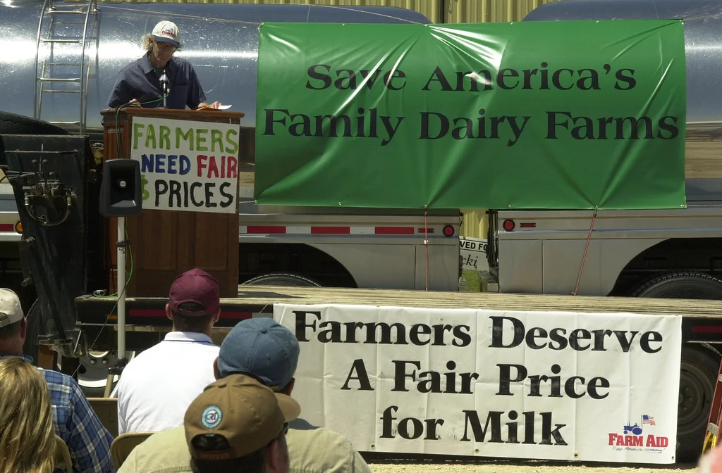 Farm Aid advocate Joel Morton at Dairy rally. Photo by Fritz Nordengren