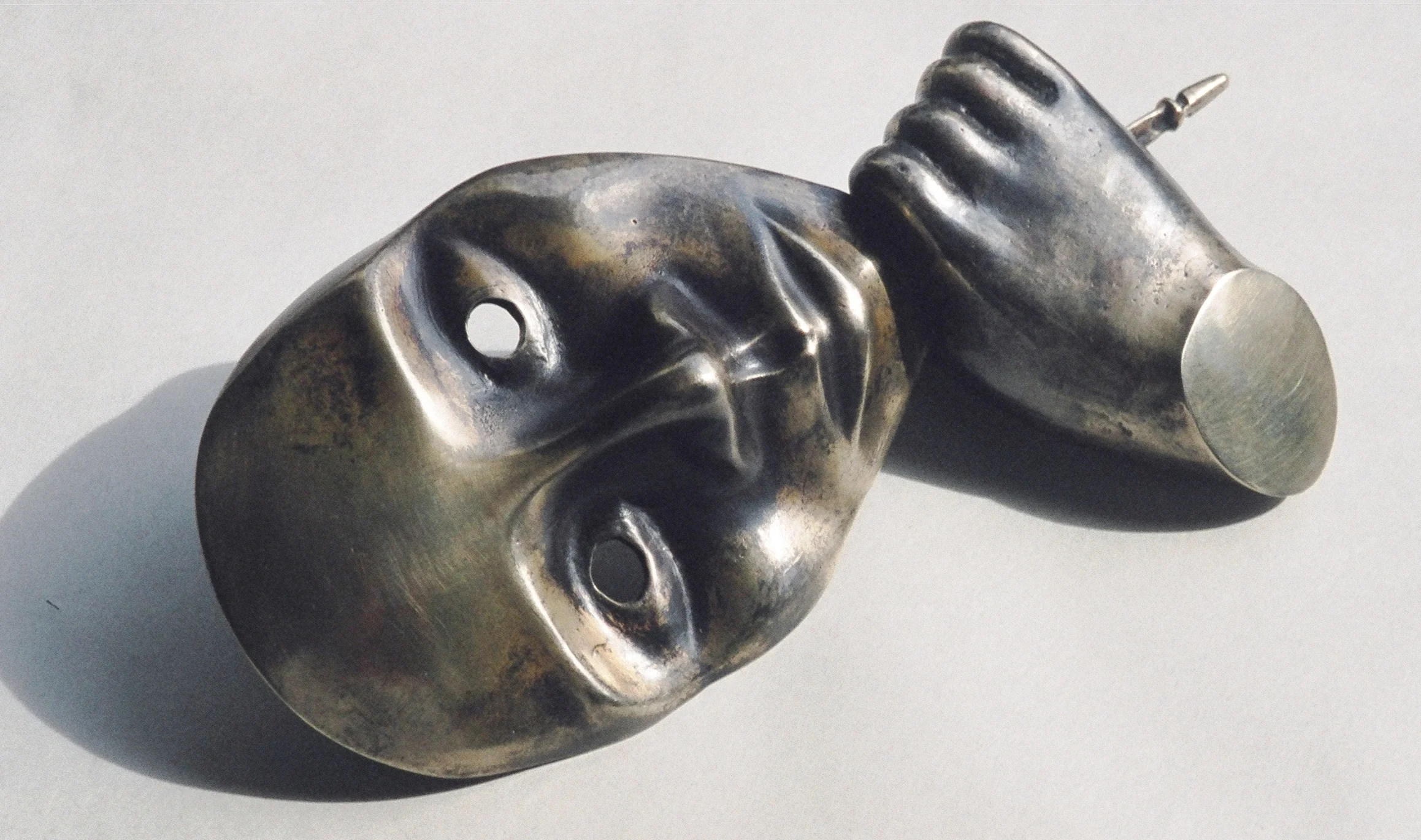 2003, Duplicity, Cast bronze,  50 x 85 x 200mm. Artis gallery, Auckland.