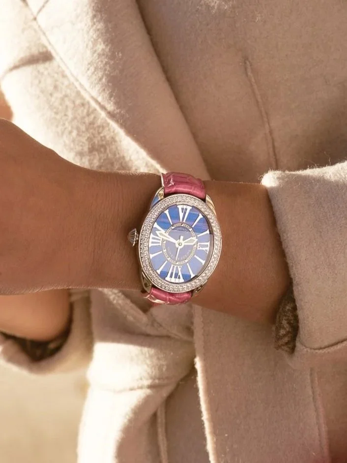 Regent 3642 women’s luxury watch on wrist featuring diamond-set case, blue dial, and signature stamping design.jpg
