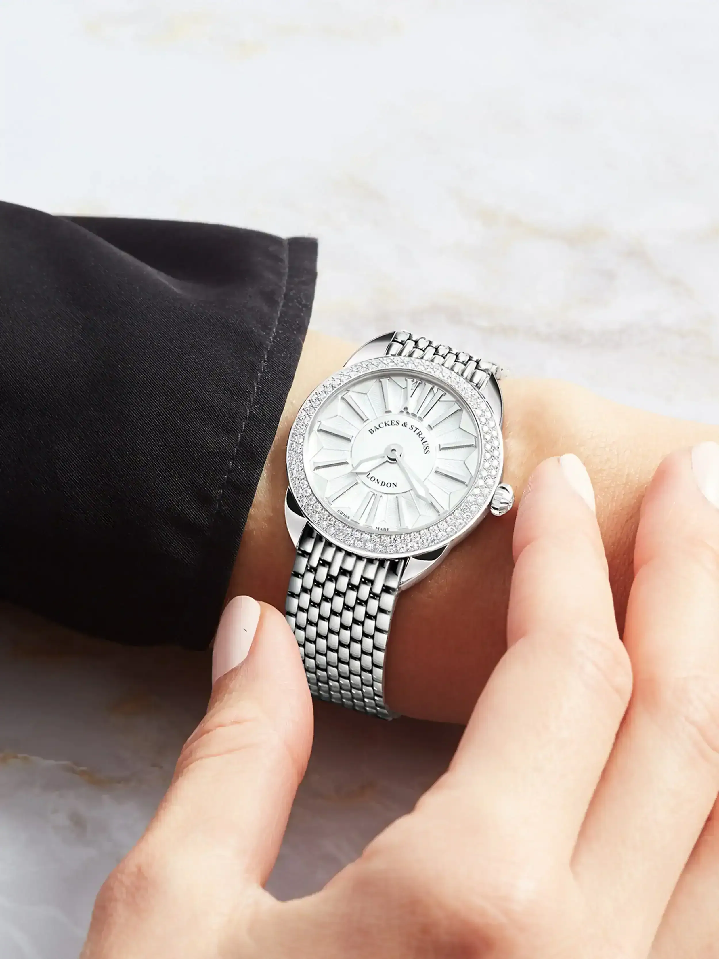 Mayfair slim diamond watch for women with 33mm steel case and white dial on the wrist