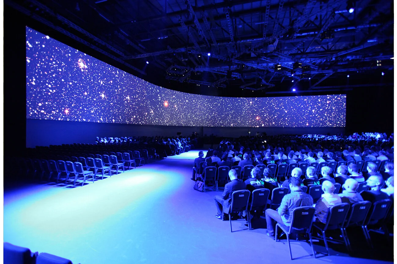 Immersive wrap around screen to surround audience