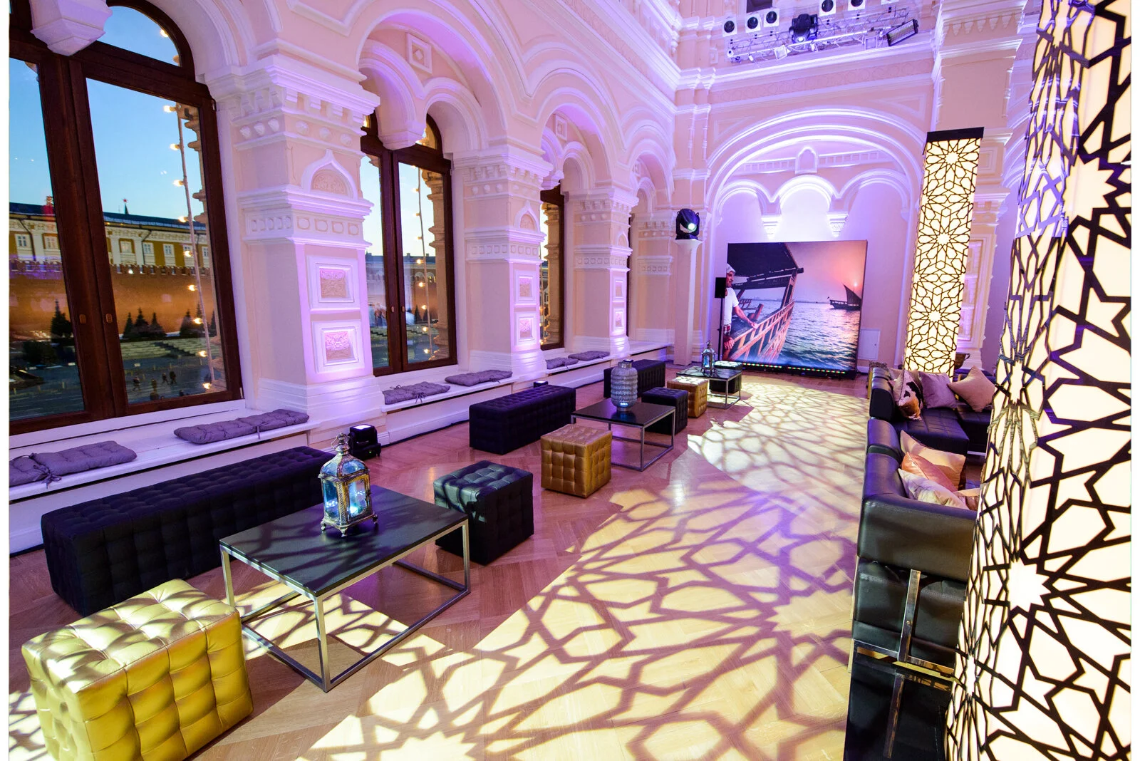 Textural lighting and decorative pillars to create Qatar hospitality lounge