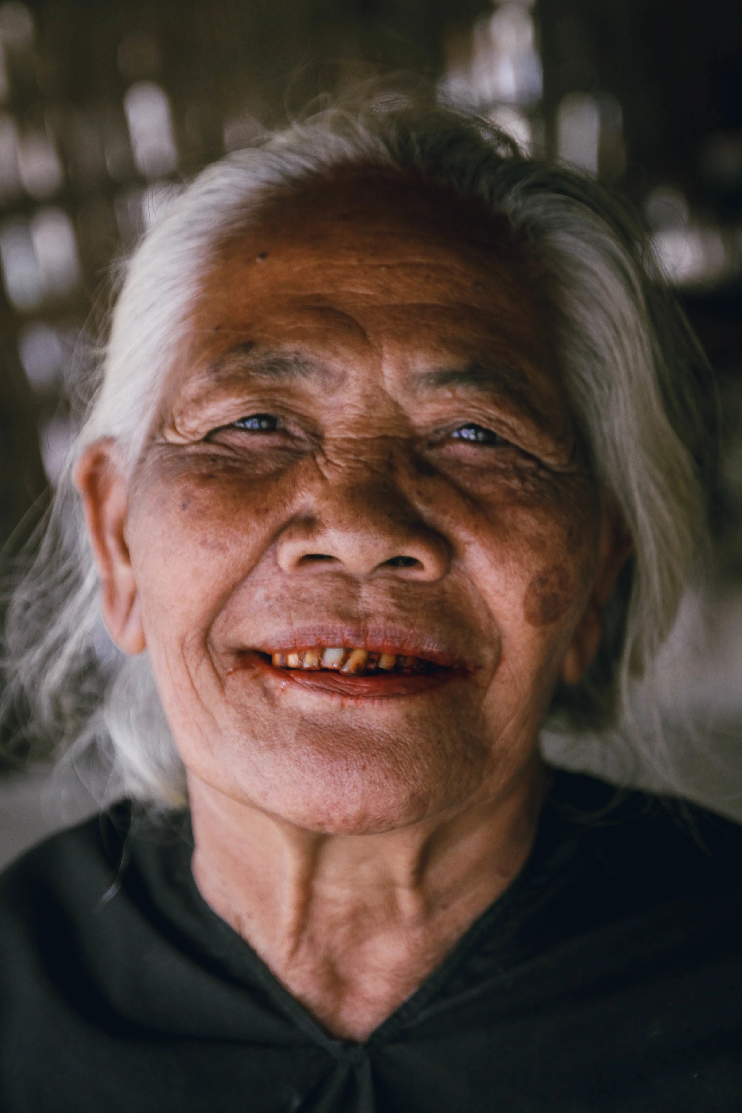 Woman Chewing Betel Nut