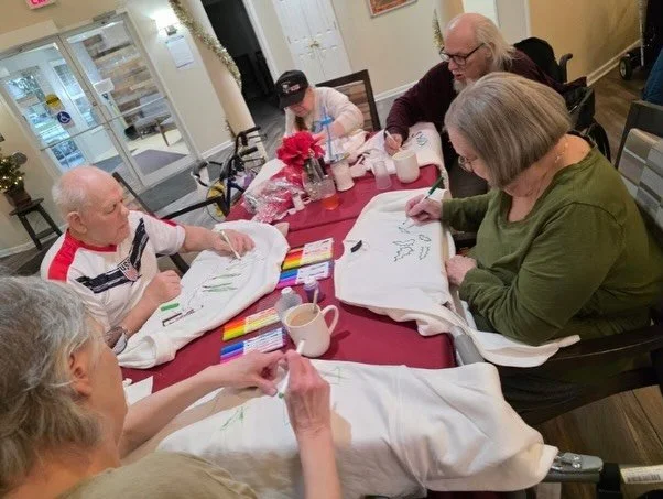 Glitter, garland, and lots of laughs 🎄✨ Our residents had a blast creating their own ugly Christmas sweaters! 
.
.
.
#AssistedLiving #SeniorLiving