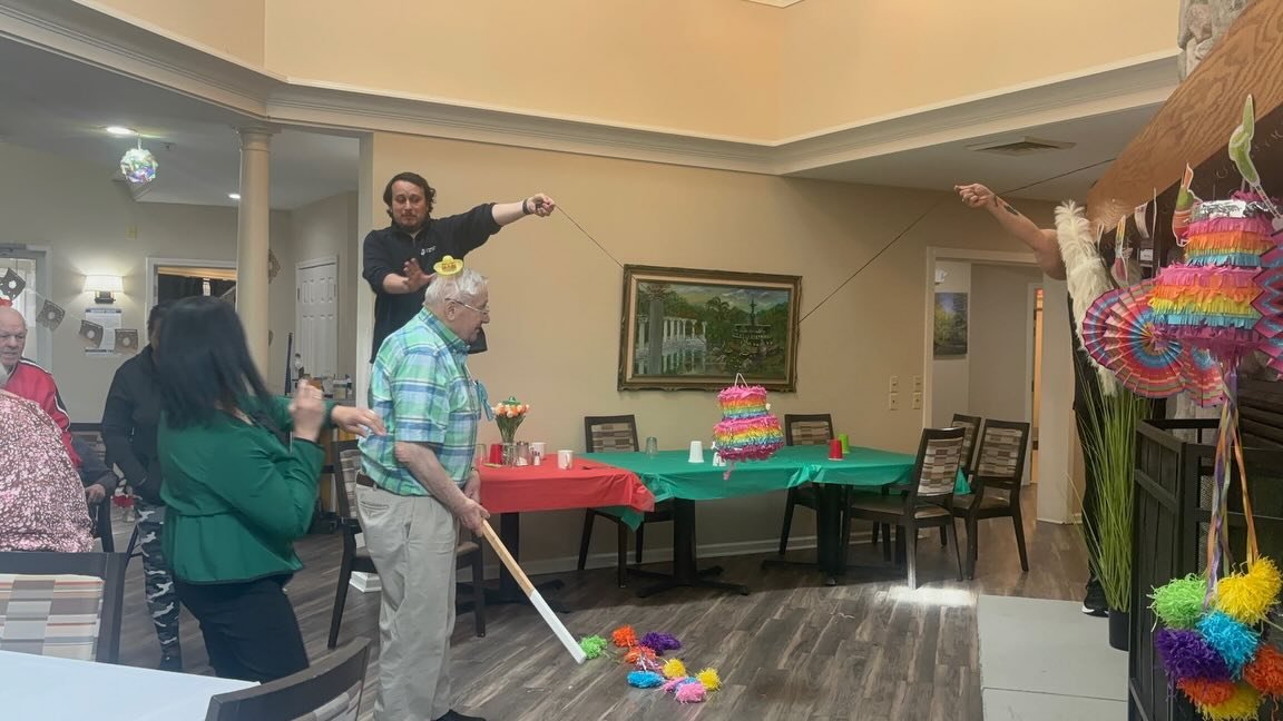 Sweet treats, big laughs, and even bigger swings! 🎉 Our residents celebrated Cinco de Mayo in the most festive way&mdash;taking turns at the pi&ntilde;ata and enjoying every colorful moment. 💃🪅
.
.
.
#AssistedLiving #SeniorLiving