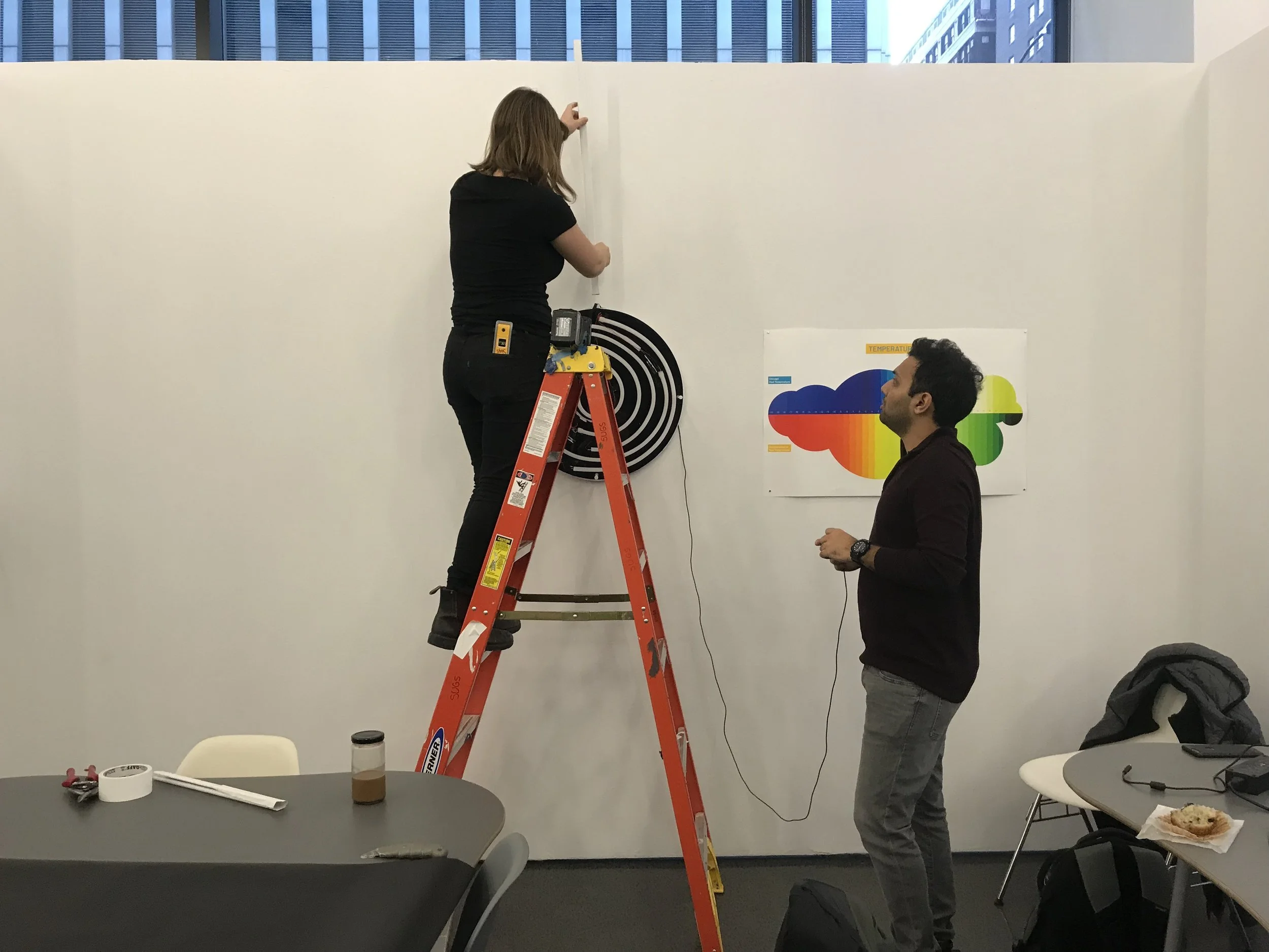  Gallery technician (left) and Akshay (right) configuring and hiding installation wiring 