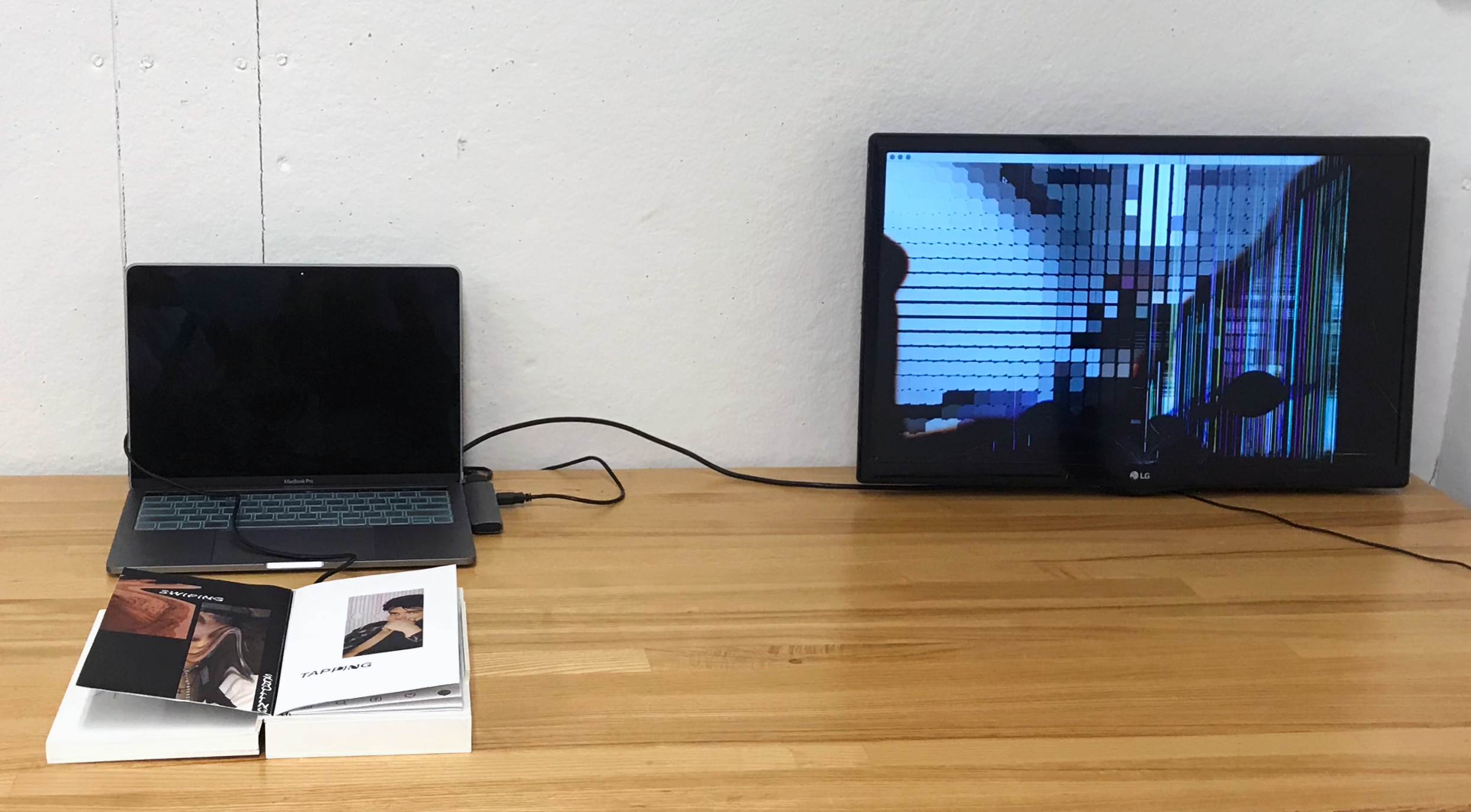 Face Book, laser print. mirror paper, wood, acrylic, laptop, television, Arduino, wire, flex sensor, 5 in x 9 in x 1 in, 2019.