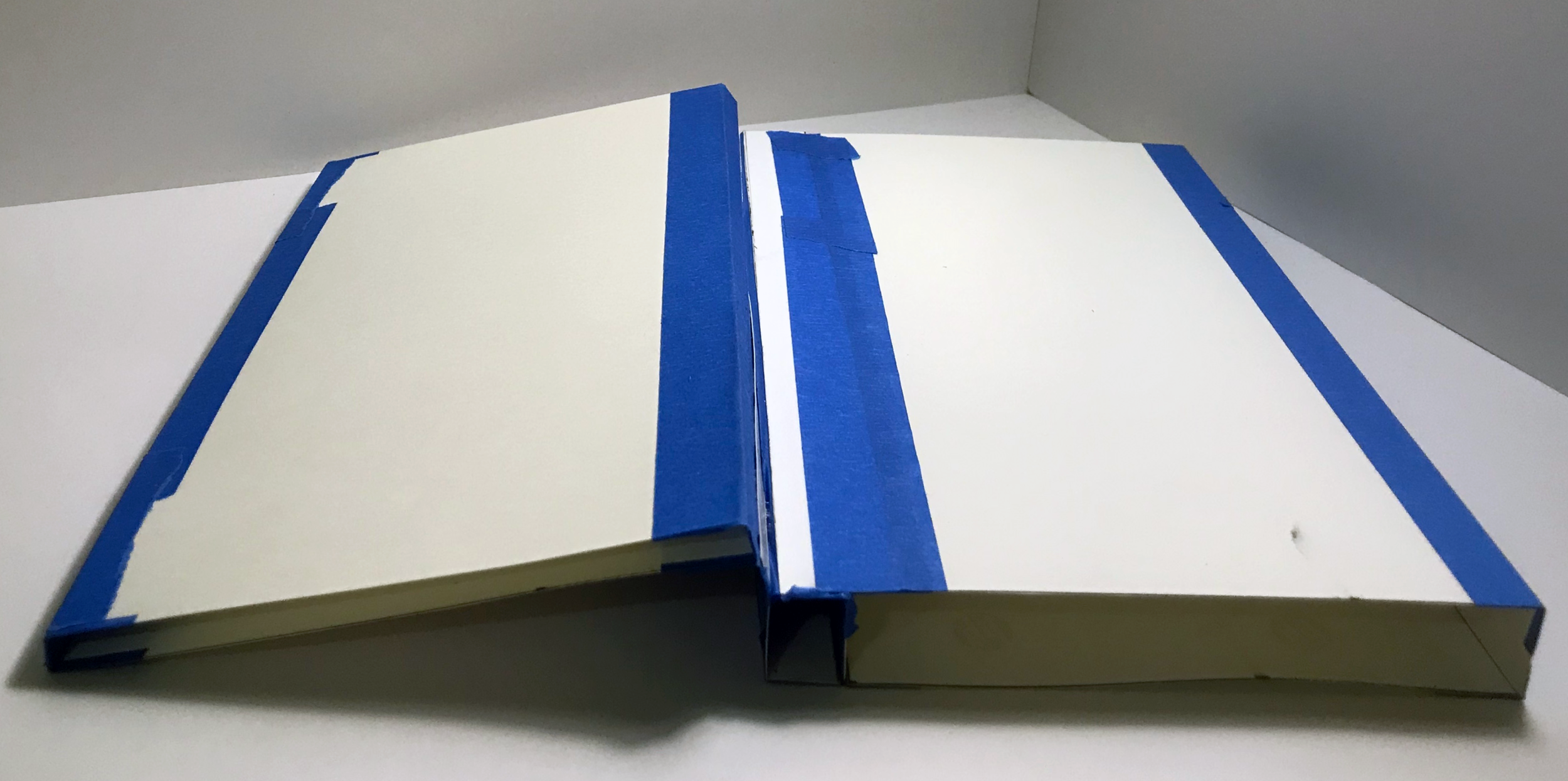 Facebook prototype, cardstock and tape, 5 in x 9 in x 1 in.